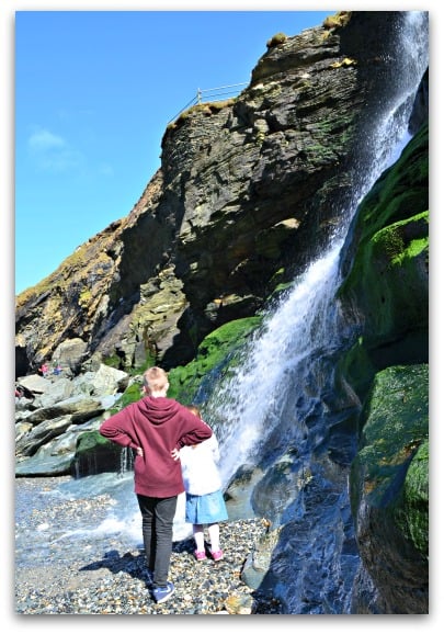 Exploring the water fall at Tintagel
