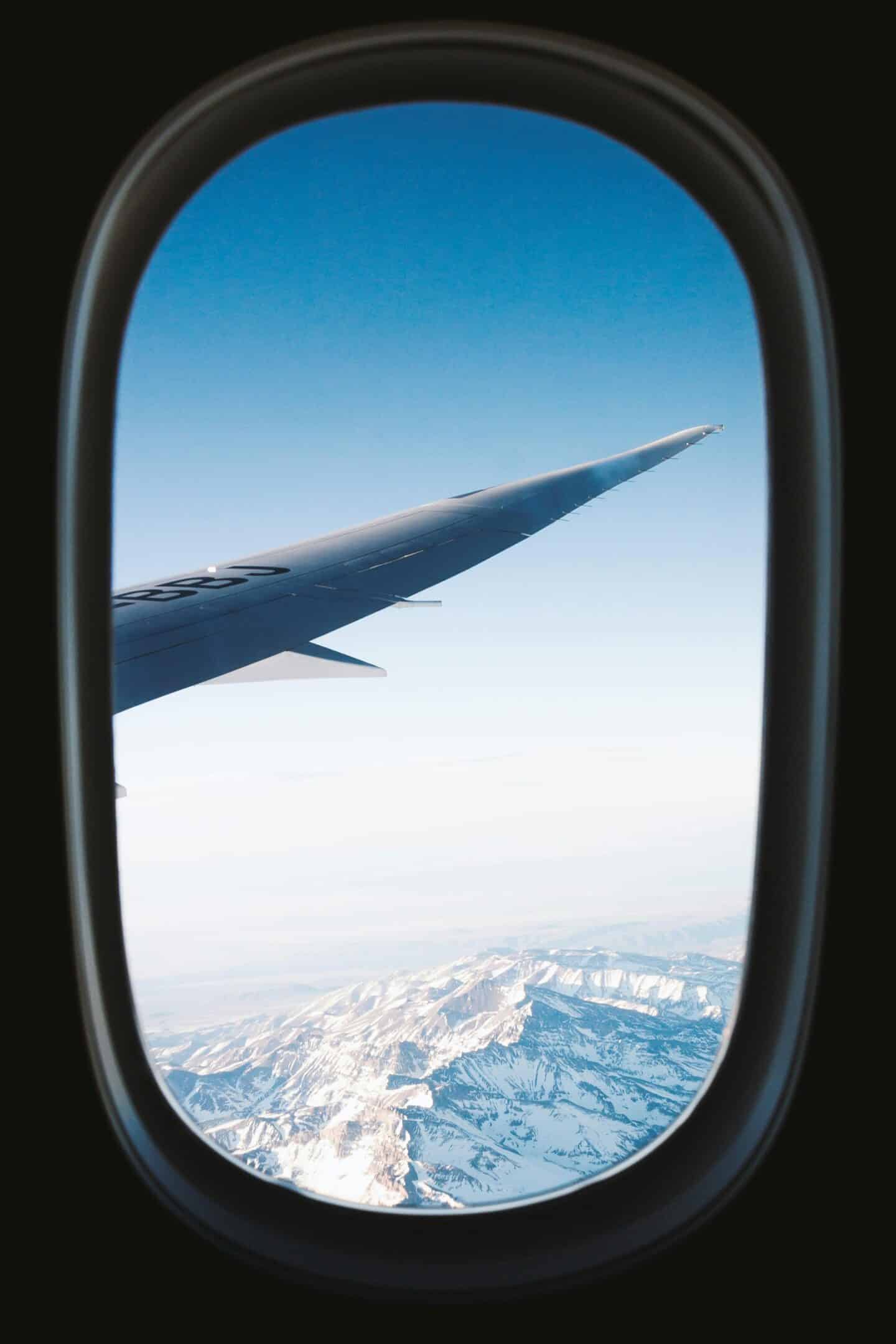 View of aeroplane wing from a plane window